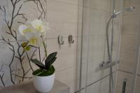 Kúpeľňa v ubytovaní Apartament Justynka