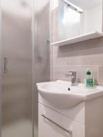 Kúpeľňa v ubytovaní Levico Al Corso Apartments