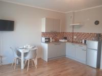Kuchyňa alebo kuchynka v ubytovaní Przytulny apartament w sercu Karkonoszy