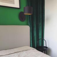 Posteľ alebo postele v izbe v ubytovaní Zielony apartament z widokiem na jezioro