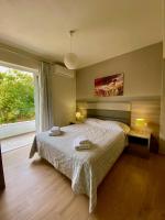 Posteľ alebo postele v izbe v ubytovaní Eirini & Manolis Apartments