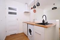 Kuchyňa alebo kuchynka v ubytovaní Seaside Studio Apartment Dworska