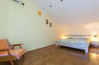 Łóżko lub łóżka w pokoju w obiekcie Apartments Lily