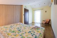 Łóżko lub łóżka w pokoju w obiekcie Apartments Lily