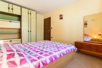 Łóżko lub łóżka w pokoju w obiekcie Apartments Lily