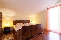 Łóżko lub łóżka w pokoju w obiekcie Apartments Lily
