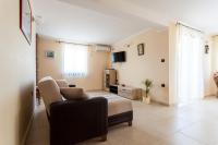 Telewizja i/lub zestaw kina domowego w obiekcie Apartments Lily