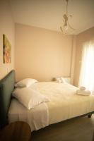 Posteľ alebo postele v izbe v ubytovaní SantaCara City Apartment