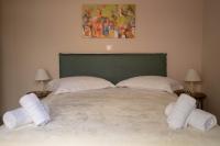 Posteľ alebo postele v izbe v ubytovaní SantaCara City Apartment