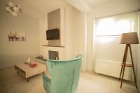 Televízia a/alebo spoločenská miestnosť v ubytovaní SantaCara City Apartment