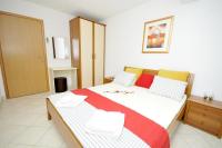 Posteľ alebo postele v izbe v ubytovaní Apartments Villa Moonlight