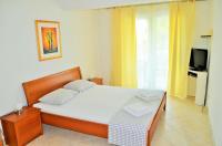 Posteľ alebo postele v izbe v ubytovaní Apartments Villa Moonlight