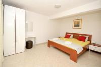 Posteľ alebo postele v izbe v ubytovaní Apartments Villa Moonlight