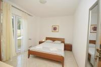 Posteľ alebo postele v izbe v ubytovaní Apartments Villa Moonlight