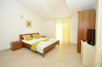 Posteľ alebo postele v izbe v ubytovaní Apartments Villa Moonlight