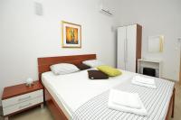 Posteľ alebo postele v izbe v ubytovaní Apartments Villa Moonlight