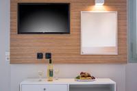 TV a/nebo společenská místnost v ubytování Summer Beach Hotel