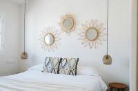 Łóżko lub łóżka w pokoju w obiekcie Dreamsea Surf House Fuerteventura