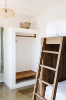 Łóżko lub łóżka w pokoju w obiekcie Dreamsea Surf House Fuerteventura