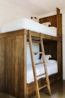 Łóżko lub łóżka w pokoju w obiekcie Dreamsea Surf House Fuerteventura