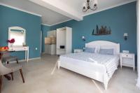 Postel nebo postele na pokoji v ubytování Evi Boutique Rooms