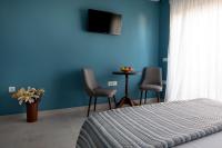 Postel nebo postele na pokoji v ubytování Evi Boutique Rooms