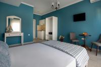 Postel nebo postele na pokoji v ubytování Evi Boutique Rooms