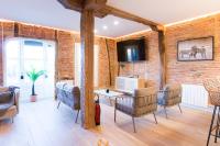 TV a/nebo společenská místnost v ubytování New Abando AC by Staynnapartments