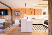 Kuchyň nebo kuchyňský kout v ubytování New Abando AC by Staynnapartments