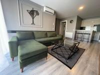 A seating area at On4 Rooms & Suites