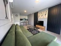 A seating area at On4 Rooms & Suites