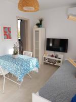 Televízia a/alebo spoločenská miestnosť v ubytovaní Casa Ble - Izla Homes