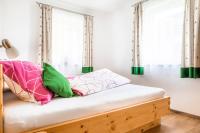 Łóżko lub łóżka w pokoju w obiekcie Ferienhaus Weitblick