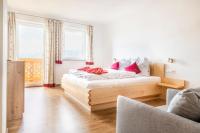 Łóżko lub łóżka w pokoju w obiekcie Ferienhaus Weitblick