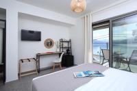 Posteľ alebo postele v izbe v ubytovaní ALMYRA seafront residence