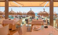 A restaurant or other place to eat at BEACHFRONT -- NEW LUXURY Apartment -- 1ª Linea Playa -- Fuengirola CITY CENTER -- Private PARKING -- Panoramic Sea Views --