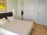 A bed or beds in a room at BEACHFRONT -- NEW LUXURY Apartment -- 1ª Linea Playa -- Fuengirola CITY CENTER -- Private PARKING -- Panoramic Sea Views --