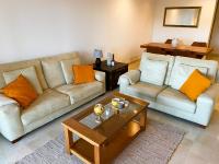 Posezení v ubytování Beautiful luxurious 2 bedroom apartment with a breathtaking view at La Cala Golf
