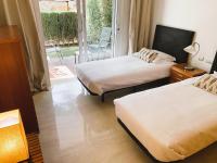 Postel nebo postele na pokoji v ubytování Beautiful luxurious 2 bedroom apartment with a breathtaking view at La Cala Golf