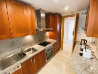 Kuchyň nebo kuchyňský kout v ubytování Beautiful luxurious 2 bedroom apartment with a breathtaking view at La Cala Golf