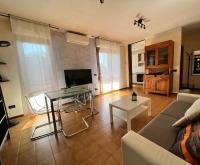 Televízia a/alebo spoločenská miestnosť v ubytovaní Silicella Apartment
