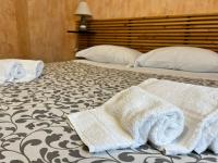 Posteľ alebo postele v izbe v ubytovaní Silicella Apartment