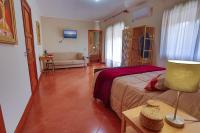 A bed or beds in a room at B&B CasaBuddace