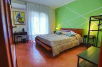 A bed or beds in a room at B&B CasaBuddace