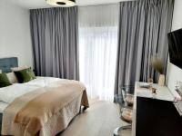 Postel nebo postele na pokoji v ubytování Apartamenty na Spokojnej