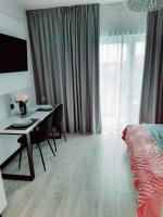 Postel nebo postele na pokoji v ubytování Apartamenty na Spokojnej