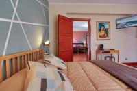 A bed or beds in a room at B&B CasaBuddace