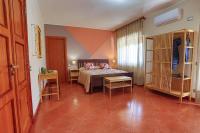 A bed or beds in a room at B&B CasaBuddace