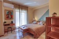 A bed or beds in a room at B&B CasaBuddace