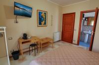 A bed or beds in a room at B&B CasaBuddace